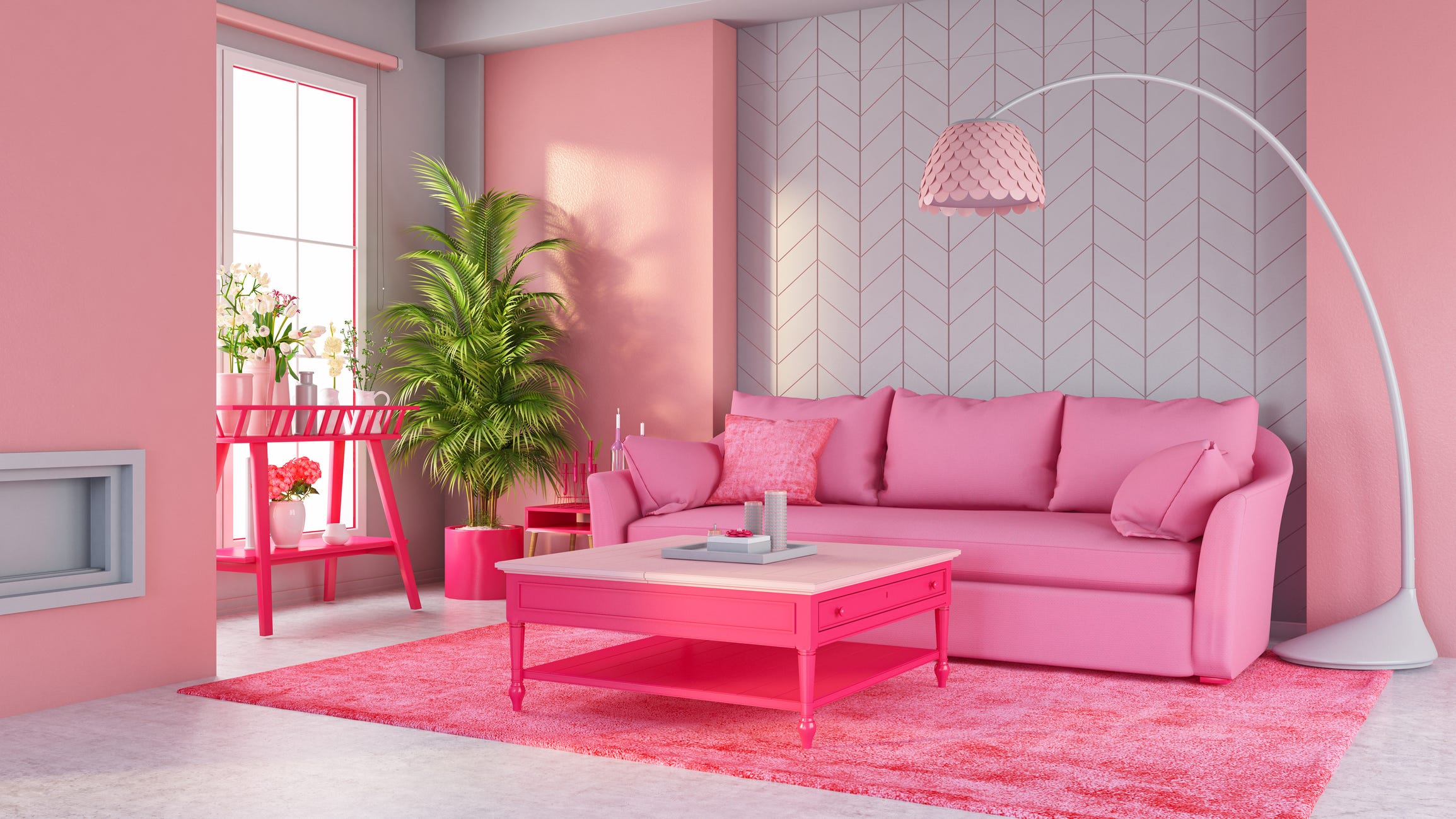 Rosafarbene Couch im Wohnzimmer mit rosafarbenem Tisch