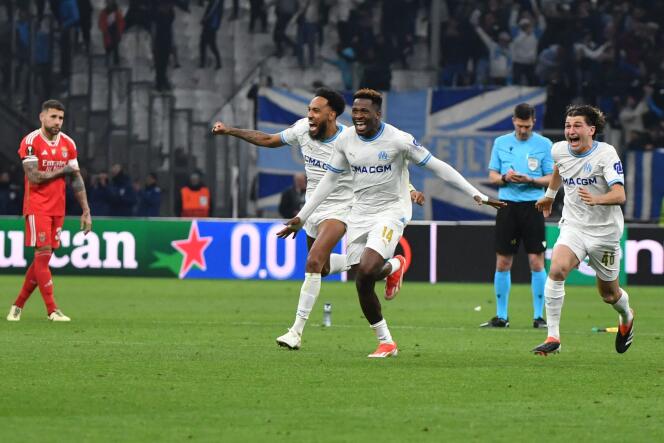 Olympians Pierre-Emerick Aubameyang, Faris Moumbagna and Gaël Lafont celebrate their victory during the Europa League quarter-final second leg, at the Stade-Vélodrome, April 18, 2024. 