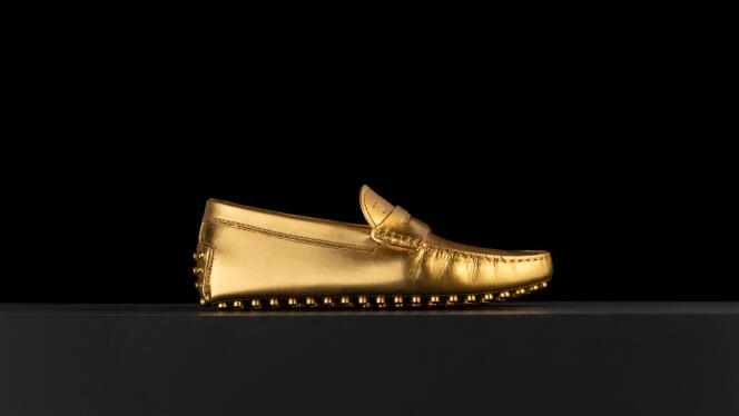 The Gommino moccasin designed by Marino Menegazzo and Mario Berta Battiloro, entirely covered with gold leaf.