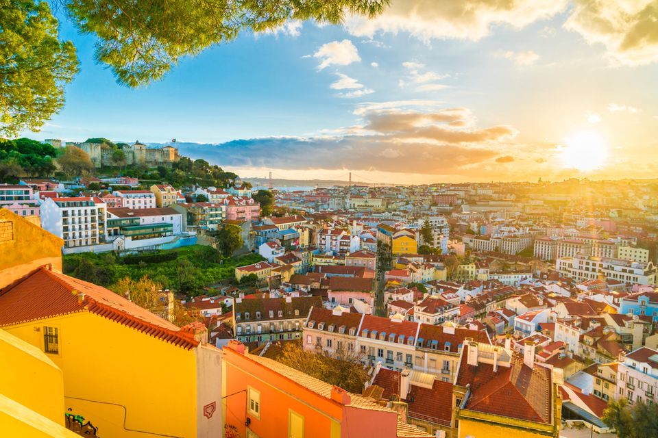 Sunset over Lisbon: 3 cheap vacation destinations for solo travelers