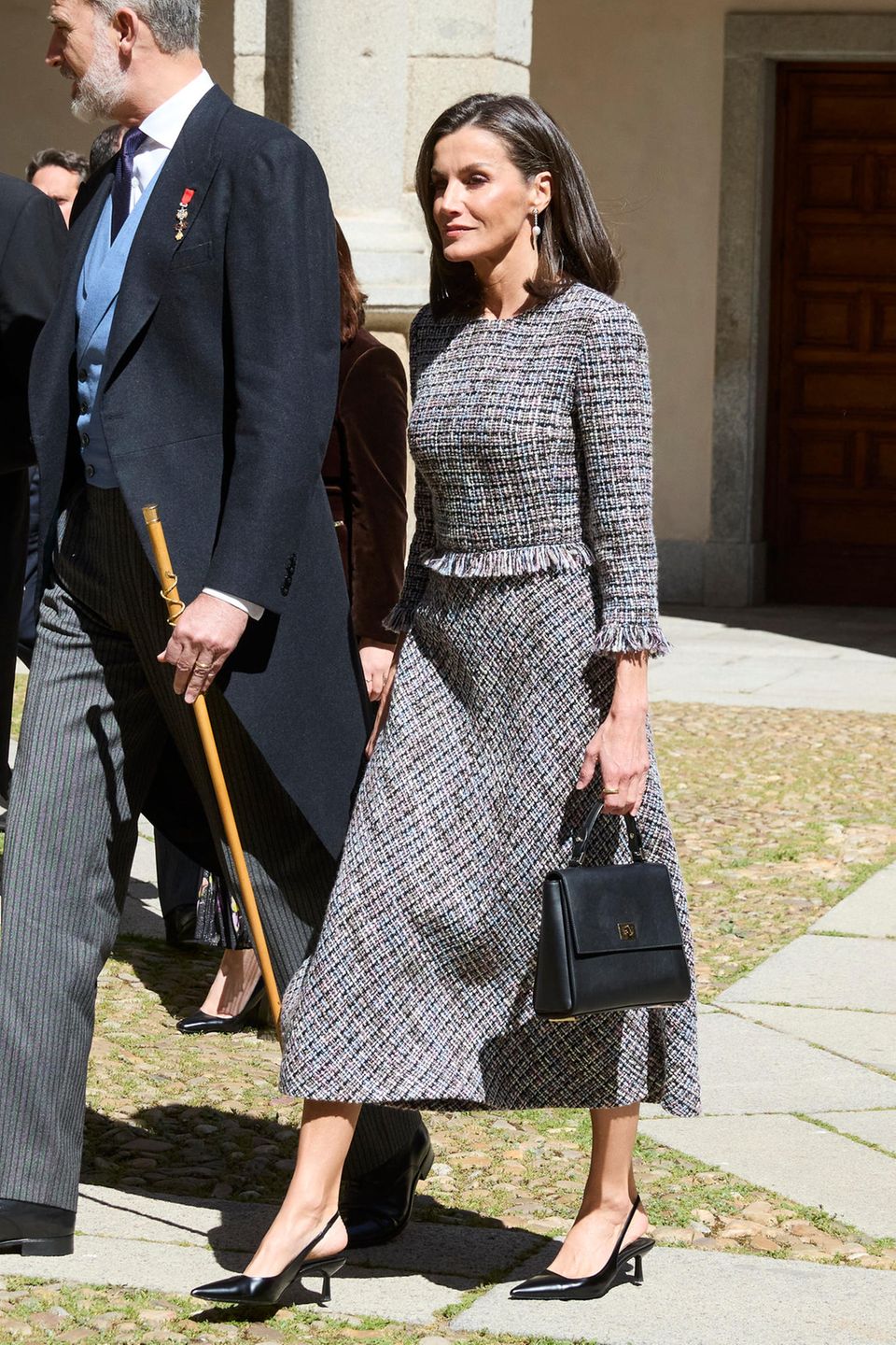 Queen Letizia in an elegantly cut tweed dress at the award ceremony "Miguel de Cervantes" Literature Prize in April 2024