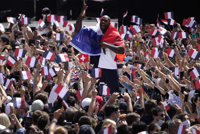 Olympic judo champion Teddy Riner with the public at the Tokyo Olympics fan zone at the Trocadéro gardens in front of the Eiffel Tower in Paris, August 8, 2021.