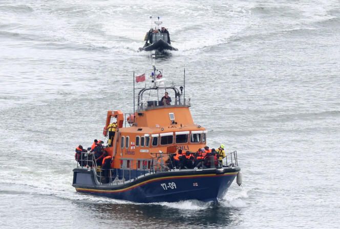 Migrants on a rescue boat before disembarking at the port of Dover, Britain, April 23, 2024. 