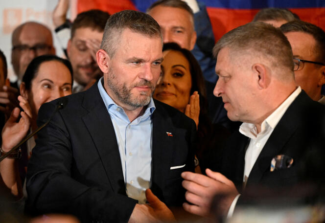 Peter Pellegrini, left, with Slovak Prime Minister Robert Fico on the day the results of the presidential election were announced, in Bratislava, Slovakia, April 7, 2024. 