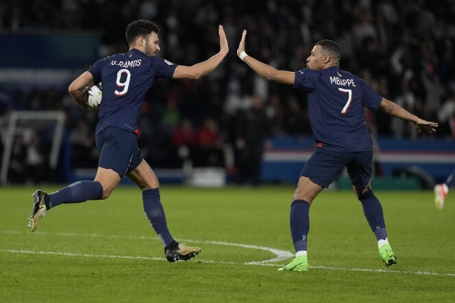 Gonçalo Ramos (left) celebrates his goal with Kylian Mbappé during the Ligue 1 match between Paris Saint-Germain and Clermont, at the Parc des Princes, in Paris, April 6, 2024.