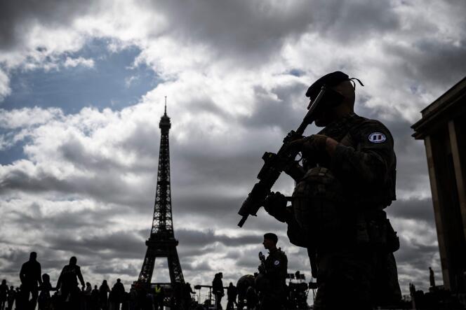 Soldiers from Operation Sentinel patrol the Trocadéro esplanade, near the Eiffel Tower in Paris, April 15, 2024.