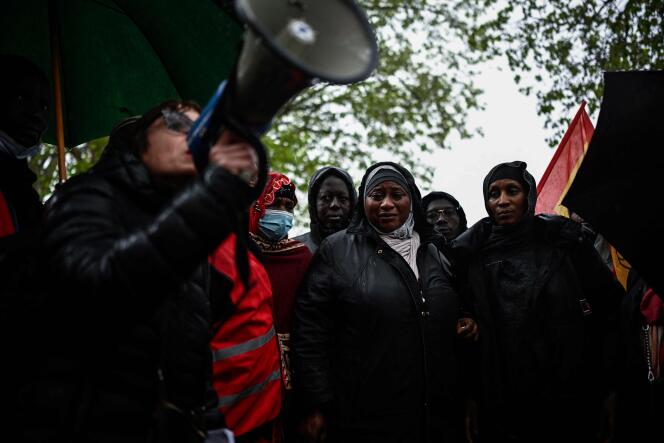 Family and trade unionists gather in Paris on April 27, 2024 to pay tribute to Amara Dioumassy, ​​a worker who died on the construction site of a basin intended to make the Seine swimmable during the Paris 2024 Olympic Games. 