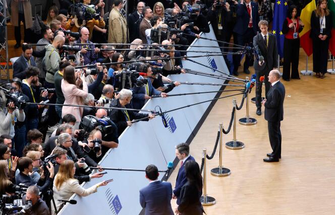 German Chancellor Olaf Scholz speaks to the press ahead of an extraordinary European Council at EU headquarters in Brussels, April 17, 2024.
