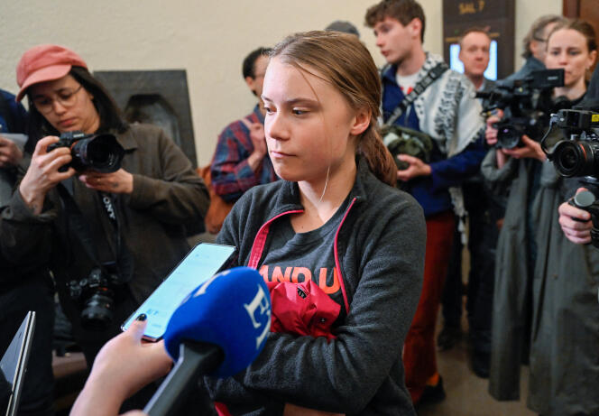Greta Thunberg speaks to journalists at the district court in Stockholm, Sweden, May 8, 2024.