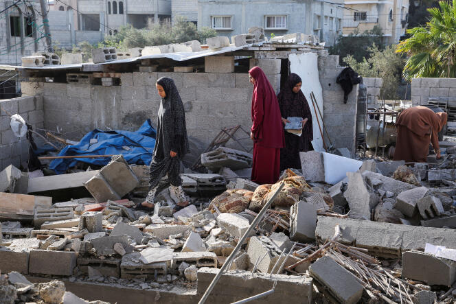 Women inspect a house after Israeli bombings in Rafah, Gaza Strip, May 3, 2024.