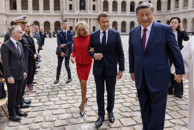 French President Emmanuel Macron welcomes President of the People's Republic of China Xi Jinping at the Hôtel National des Invalides in Paris on May 6, 2024.