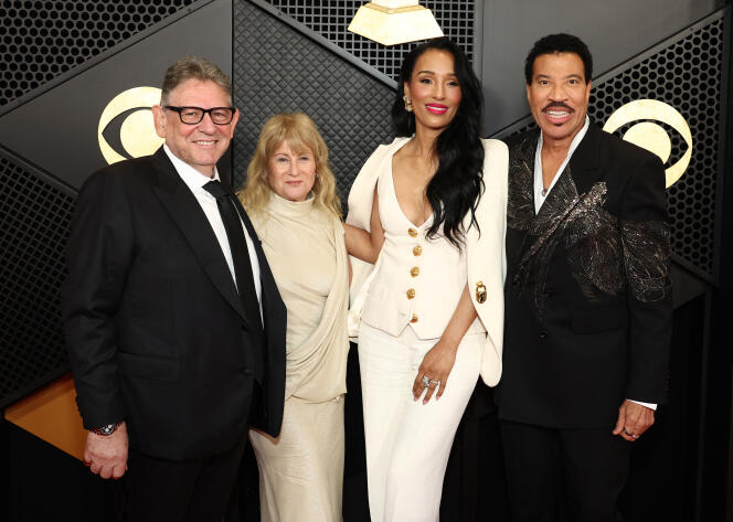 From left to right: Lucian Grainge, boss of Universal Music Group, Caroline Grainge, Lisa Parigi and Lionel Richie, during the 66th Grammy Awards ceremony, at the Crypto.com Arena, in Los Angeles, February 4, 2024.