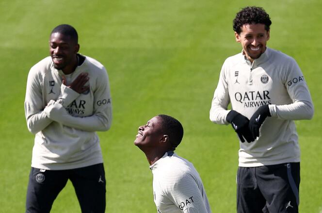 Parisians Ousmane Dembélé, Nuno Mendes and Marquinhos (from left to right), during a training session in Poissy (Yvelines), May 6, 2024.