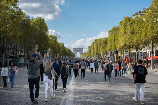 Tourists on the Champs-Elysées, in Paris, September 18, 2023.
