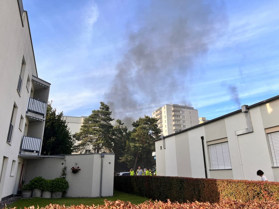 Smoke over houses.