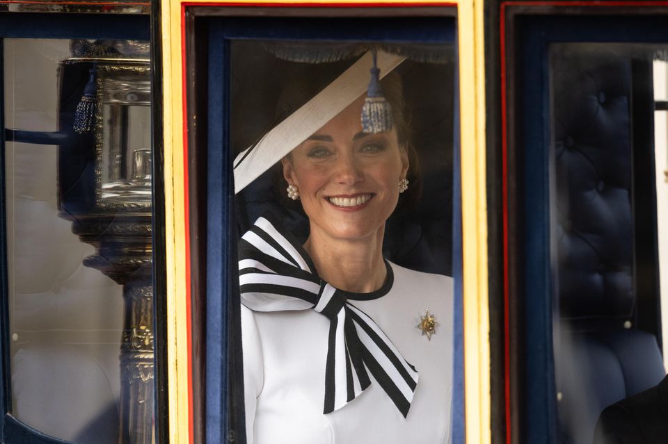 Catherine, Princess of Wales, in the carriage. 